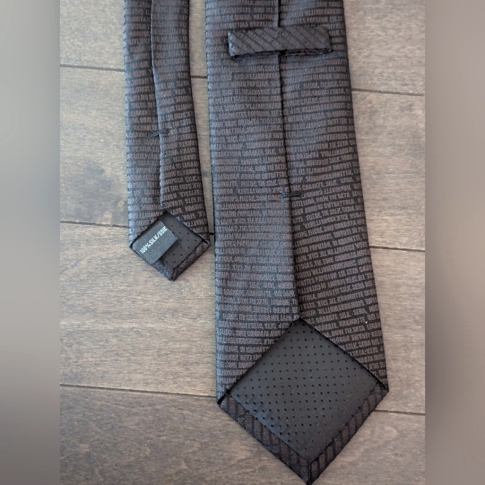 Silk tie with tiny text